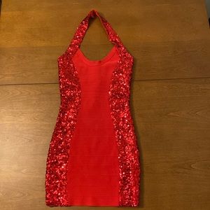 Red sequin cocktail dress .